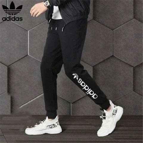 Adidas black sport-casual sweatpants in a 260g small terry-loop build