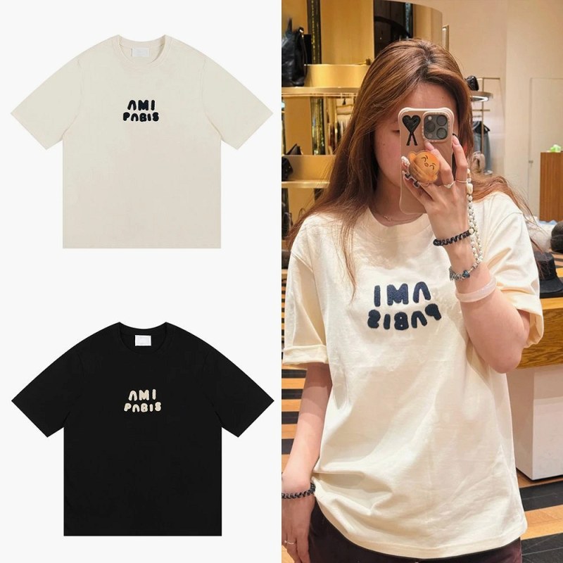 Ami Paris navy crew-neck tee in 100% cotton with embroidered lettering and a loose, boxy cut