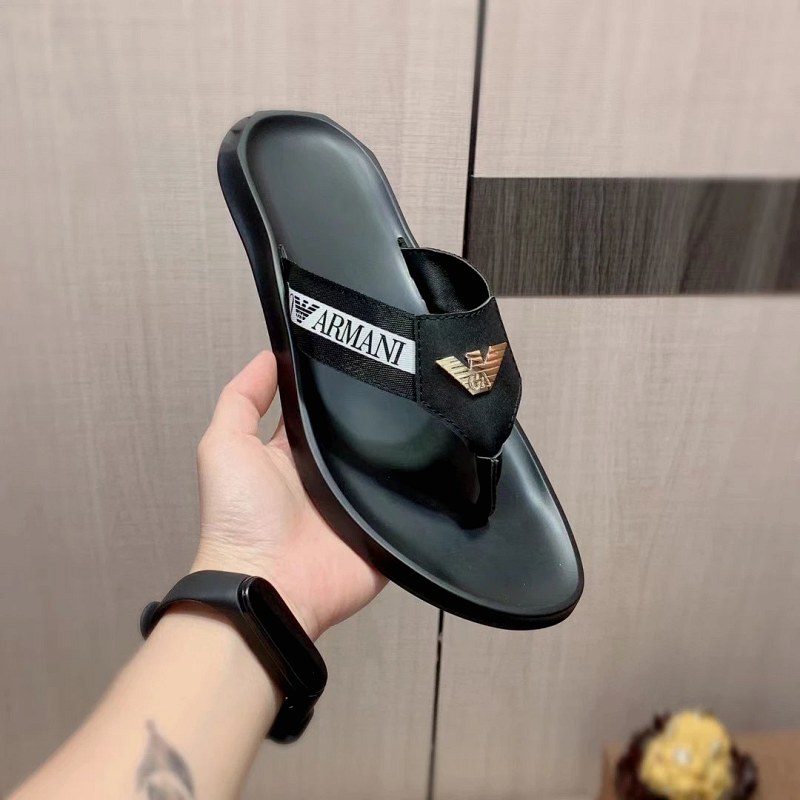 Gray Armani slides with a stated cowhide upper and molded double-layer sole