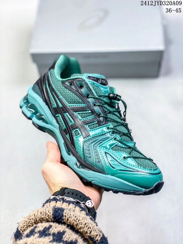 ASICS GEL-KAYANO 14 in a blue athletic colorway, with a breathable mesh upper and AHAR+ rubber outsole