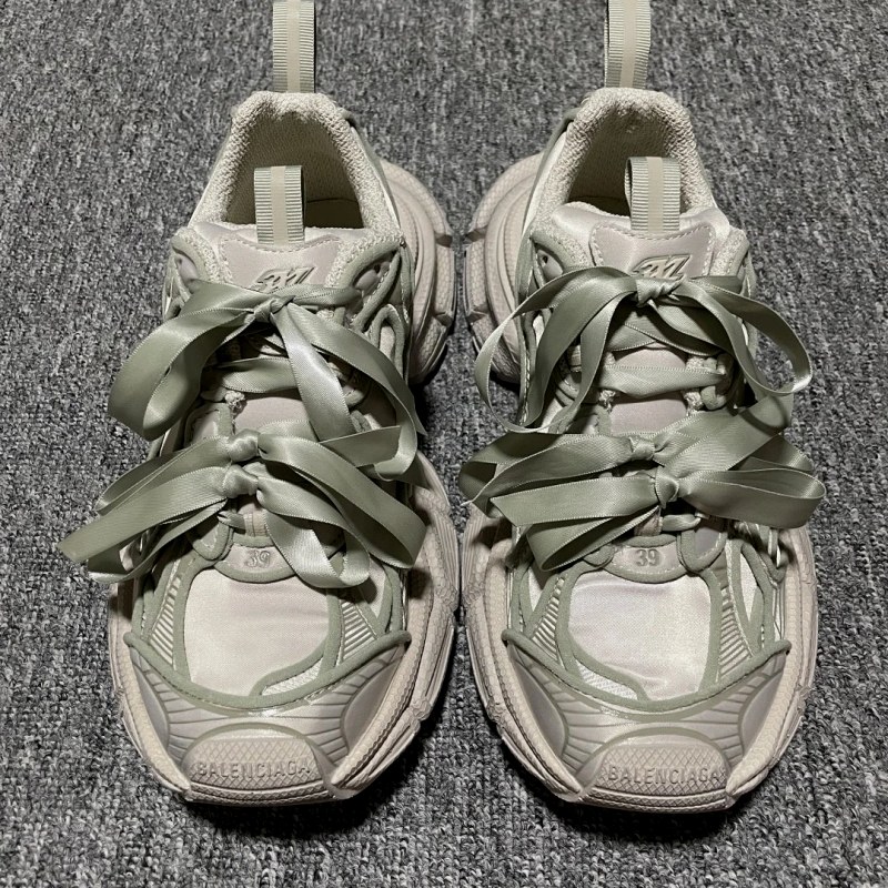 Balenciaga 3XL Satin Bows: the oversized 3XL in a bow-and-lace finish, listed a size large