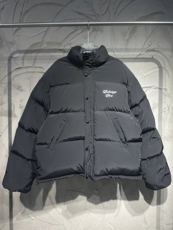 Balenciaga oversized puffer jacket in black or red with a stated duck-down and cotton fill