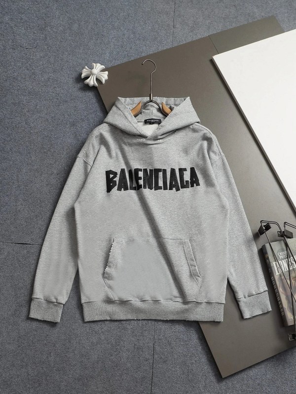 Balenciaga gray hoodie: relaxed drop-shoulder cut in garment-washed cotton