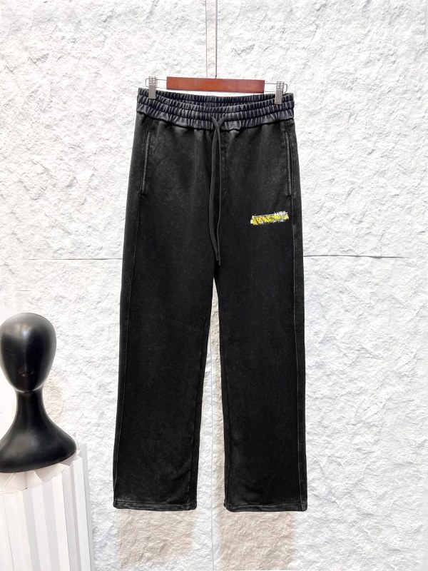 Balenciaga Masking Tape wide-leg black pants in a stone-washed faded finish