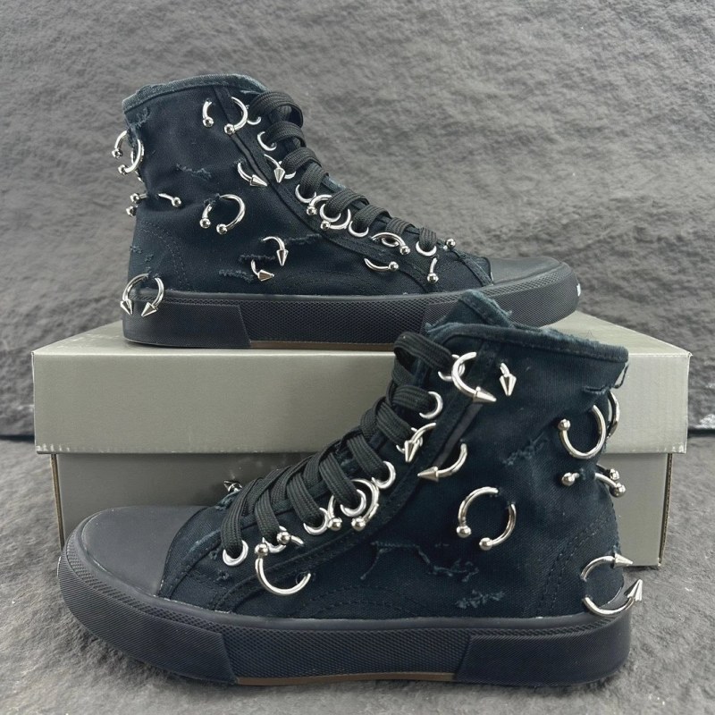Balenciaga Paris High Top in pierced, destroyed black canvas