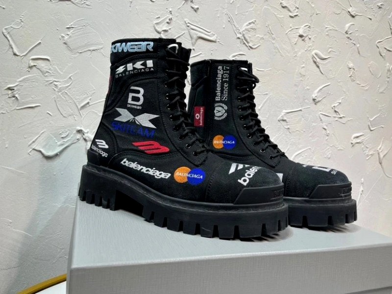 Balenciaga patched coarse-denim high-top with a nine-eyelet lace-up and toothed rubber outsole
