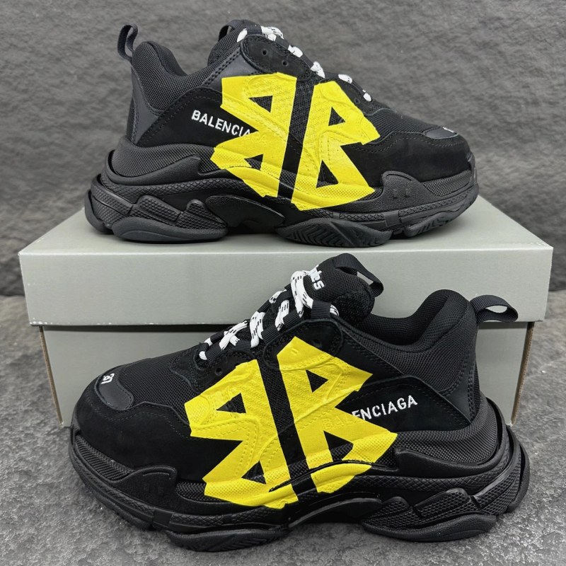 Balenciaga Triple S Tape Type in black and yellow: a polyester and polyurethane upper on a three-layer stacked outsole