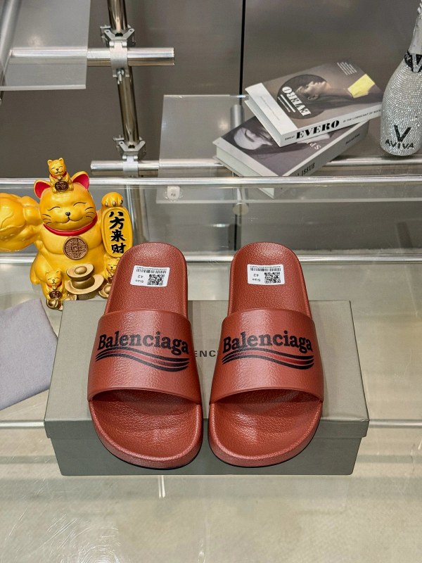 Balenciaga gray slides listed with a PU upper, rubber outsole, and a 38–46 size run