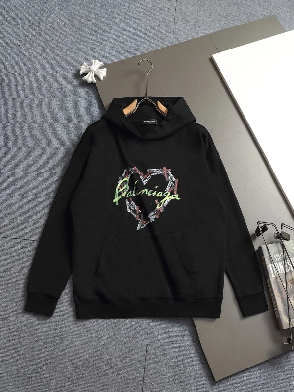 Balenciaga-style black hoodie with a direct-print tape graphic and a washed, drop-shoulder cut