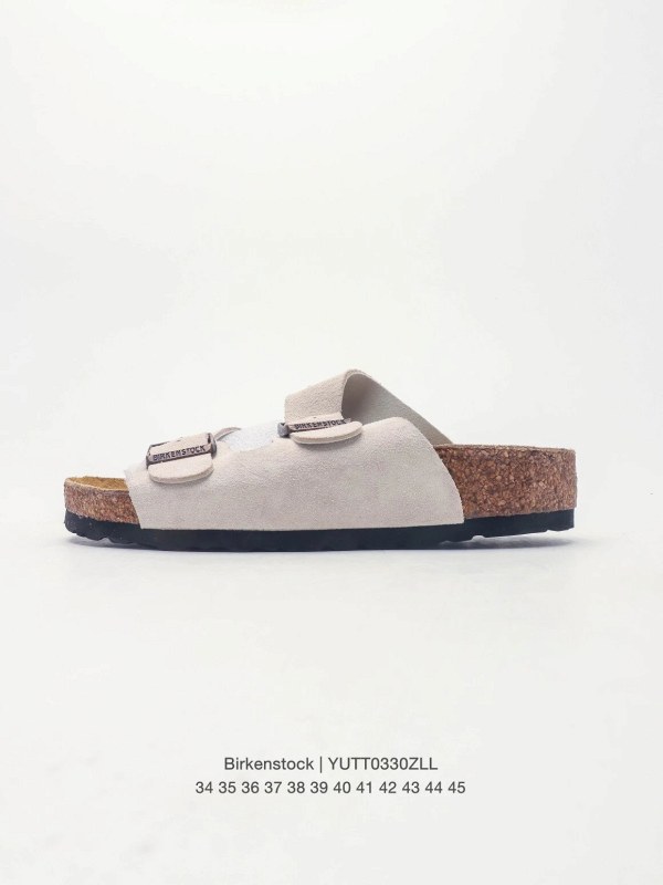 Birkenstock gray two-strap slides with a soft leather upper and cork-rubber footbed