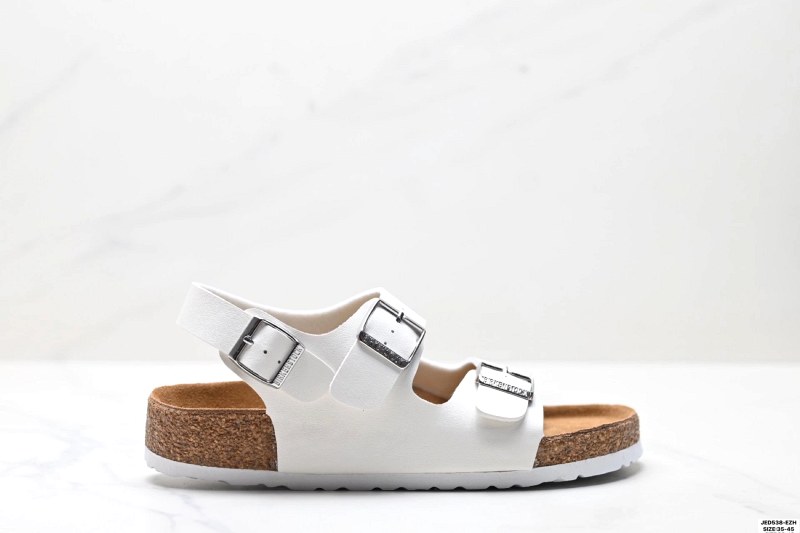 Birkenstock-style suede two-buckle slides with a shearling-lined cork footbed