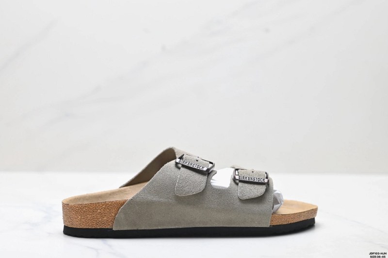 Gray Birkenstock slides with a double metal-buckle, two-strap upper