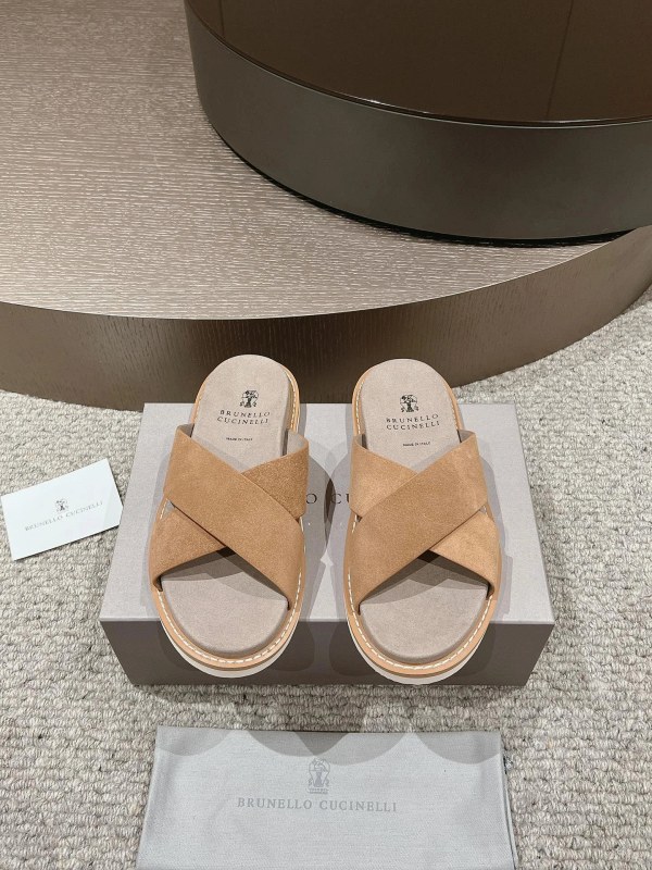 Brunello Cucinelli gray suede slides with an adjustable metal buckle strap
