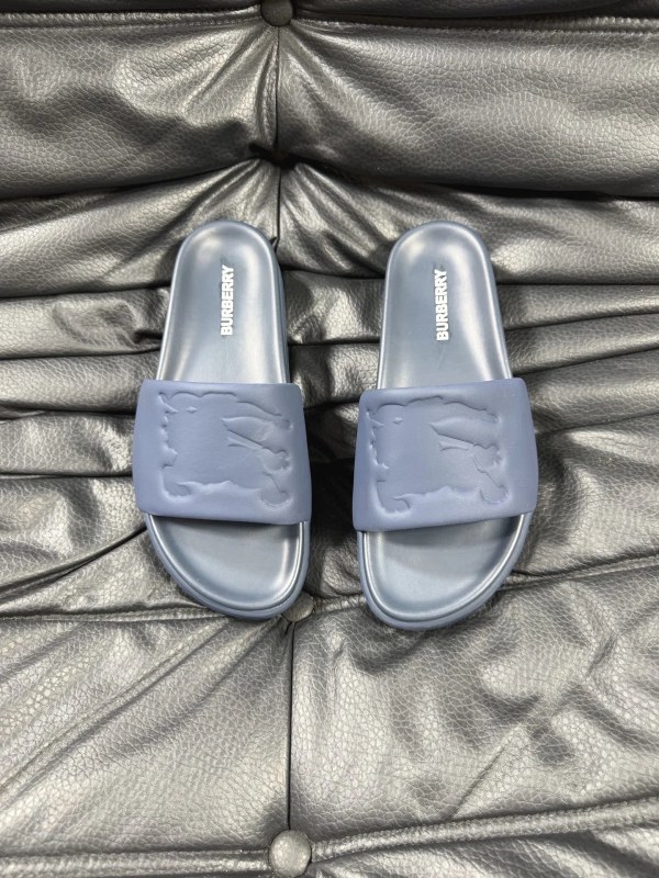 Burberry check slide in gray with a molded footbed and slip-on build