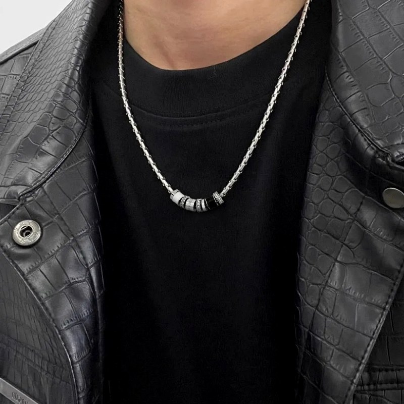 Black Ball-Chain Necklace With an 18K Gold Geometric Pendant, Listed as Chrome Hearts