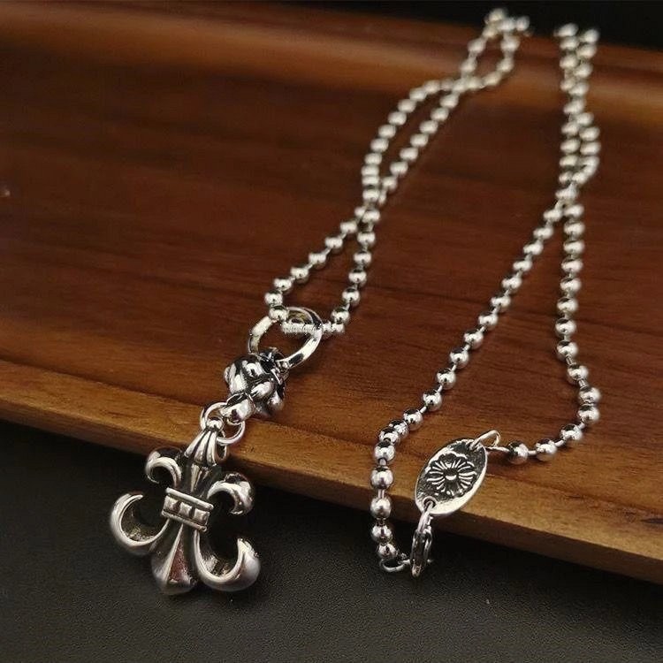 Chrome Hearts Silver Necklace with Cross and Scout-Flower Pendant in a Modern Everyday Style