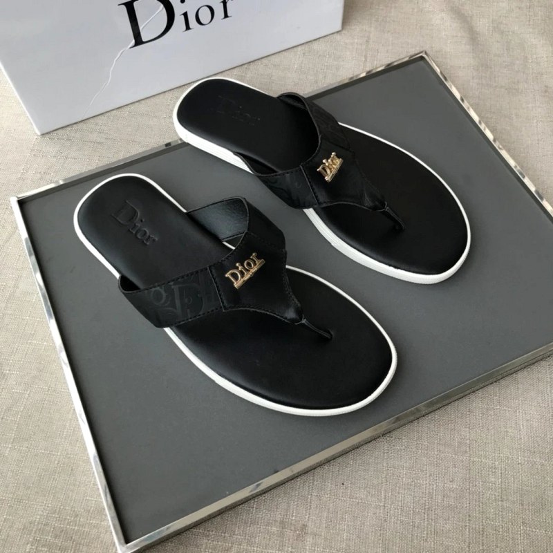 Dior Black Sandals in a Casual Slide Style With Embossed Lettering and Rubber Outsole