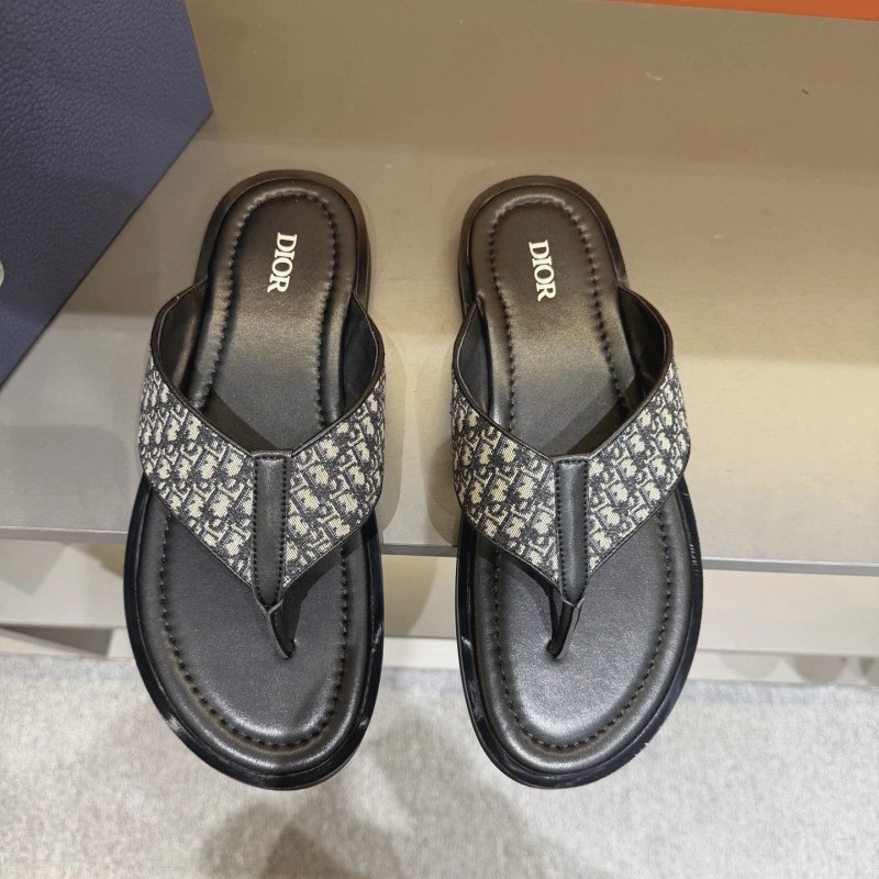 Dior Alias Slide in Black: Grain Calfskin, Oblique Print and a Metal Diamond Emblem