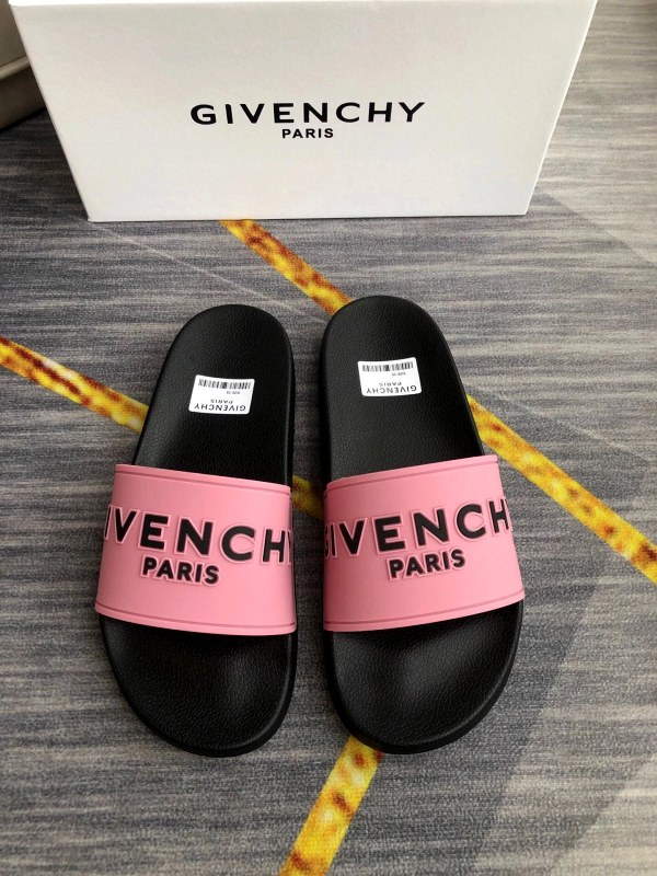Givenchy black slides with an embossed logo upper, sized 35–45