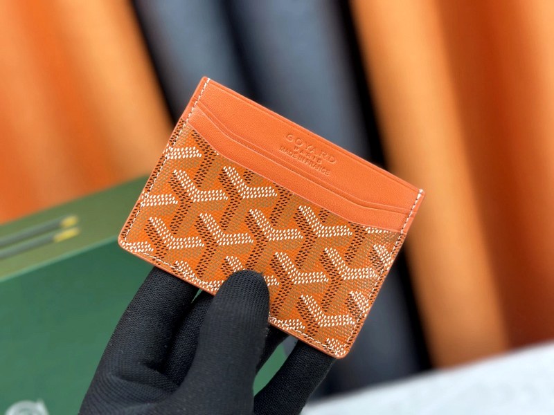 Goyard Orange Card Case with a 10.5 by 7.5 Stated Footprint