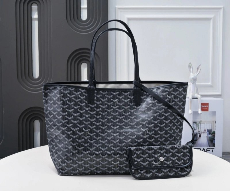 A Black Goyard Tote with a Coated Linen Base and Steel Hardware