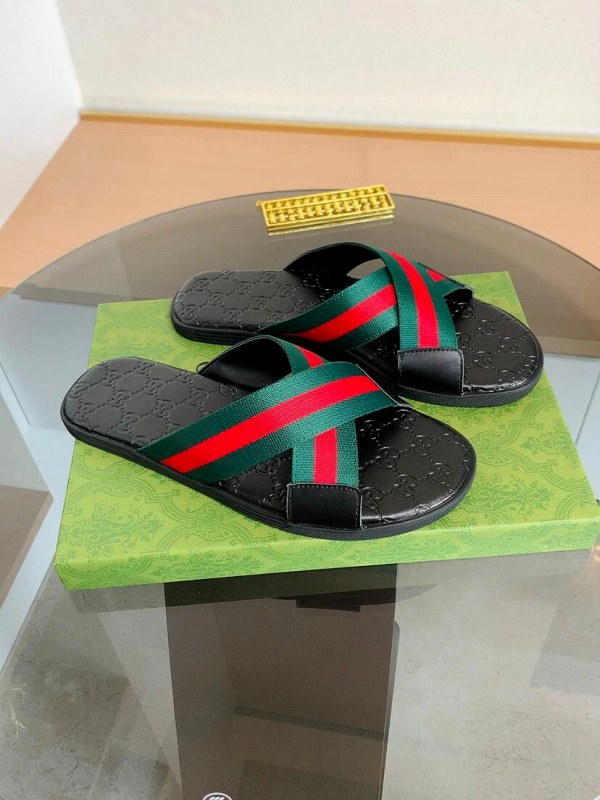 Gucci Black Slides with a Molded Footbed in a Casual Slip-On Shape