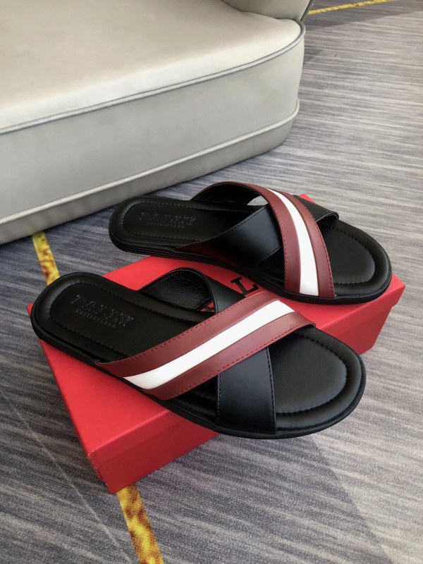 Gucci black cross-strap slide sandal with a padded double-layer sole