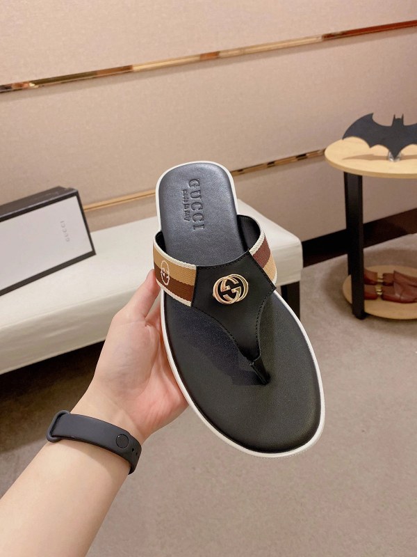 Gucci gray slides: a casual rubber slide listed with a lighter, slip-resistant outsole