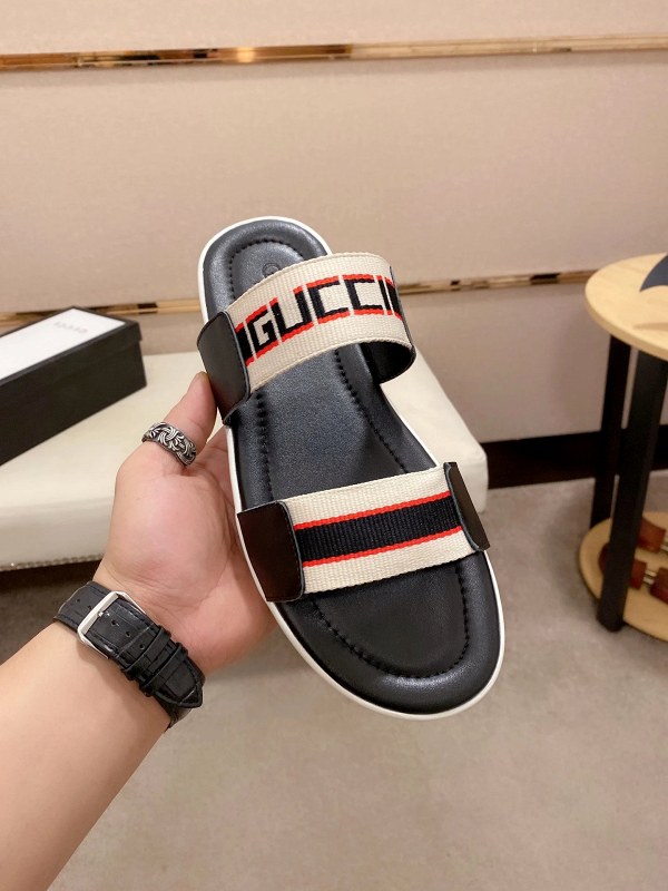 Gucci black slides in a casual low-profile cut with a listed size run of 38 to 45