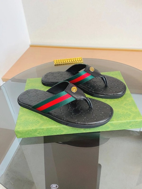 Gucci white slide sandals in a casual, easygoing shape — flat-look upper, lightweight outsole, sizes 39–45