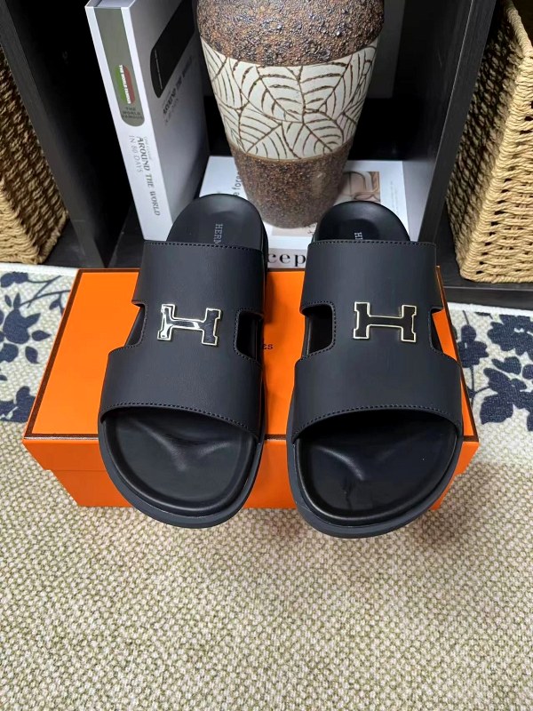 Hermes Black Leather Slides With a Rubber Outsole, Casual H-Cutout Style