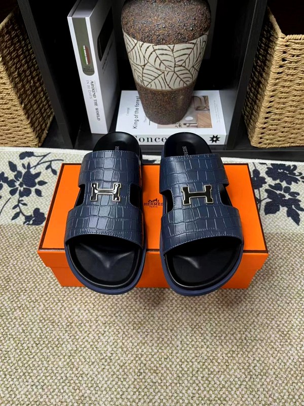 Hermes Black Slides: Casual Cowhide Slip-Ons With a Rubber Outsole