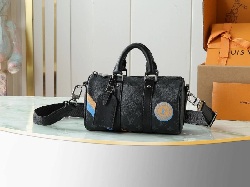 Louis Vuitton Keepall 25 in Monogram Eclipse Reverse: a compact black-and-grey shoulder duffle