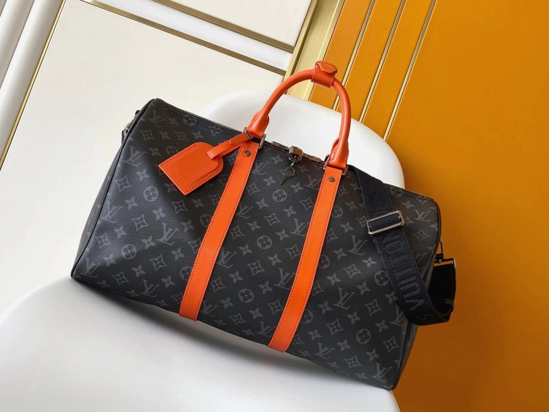 Louis Vuitton Keepall Bandoulière 45 in Monogram Eclipse: carry-on-sized duffle with a detachable wide strap