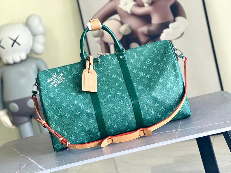 Louis Vuitton Heritage Keepall 50 in Green: a 50 cm cabin-size duffel with detachable strap