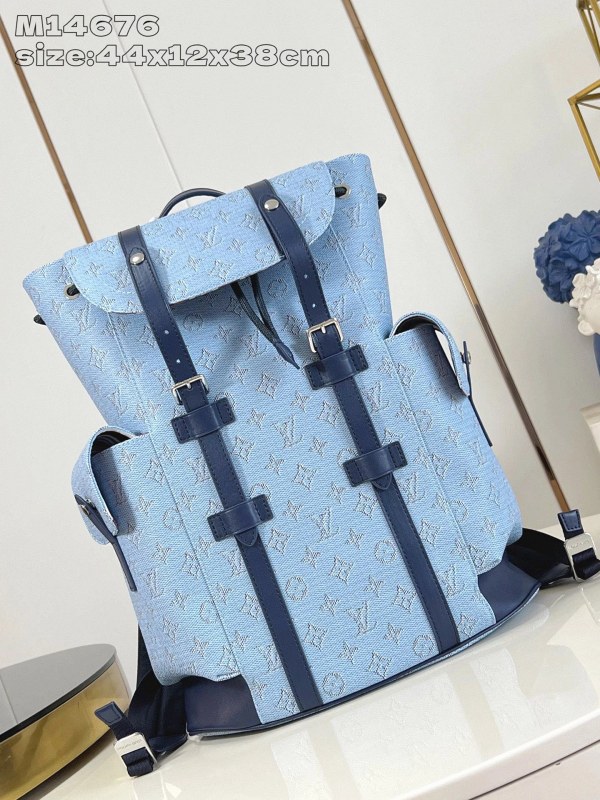 Louis Vuitton Christopher MM Backpack in Blue Monogram Heritage Coated Canvas