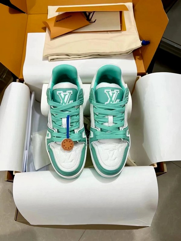 Louis Vuitton green LV Trainer-style sneakers in grained calf leather and monogram denim