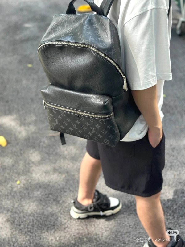 Louis Vuitton Discovery Backpack in Monogram Canvas and Taïga Leather, 29 × 38 × 20 cm
