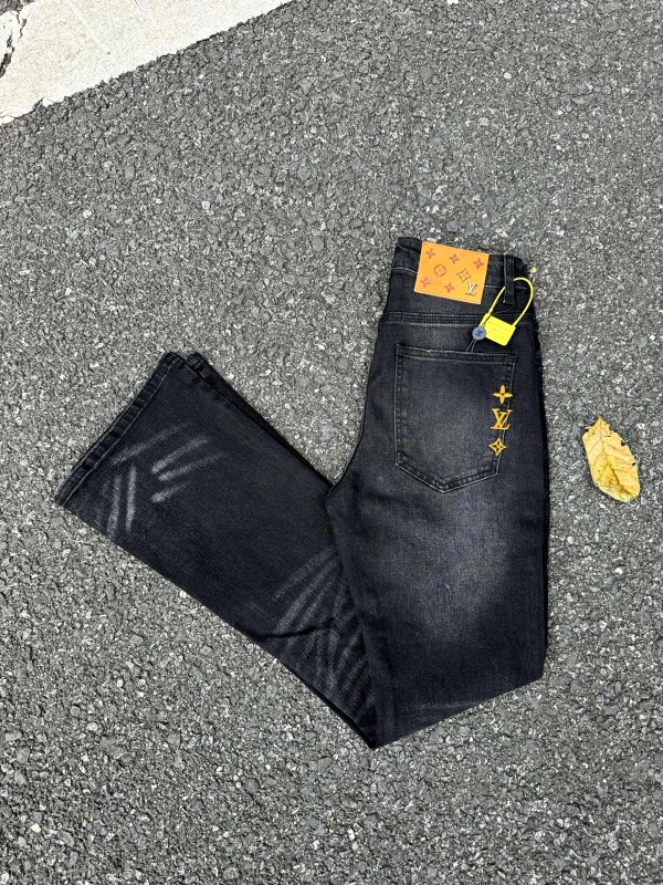 Louis Vuitton jeans with an embroidered logo button, high-waist straight cut, and sizes 28–36