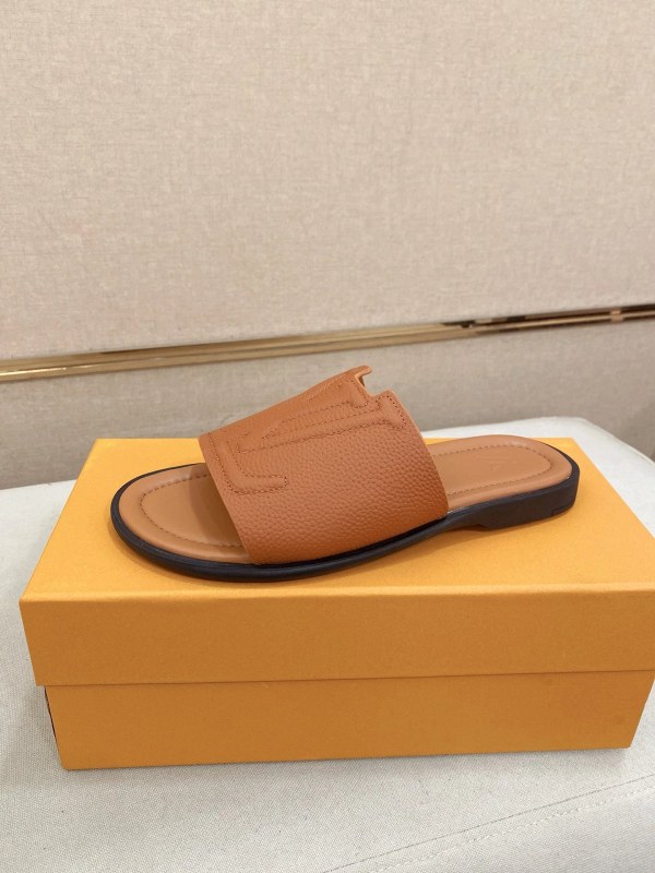 Louis Vuitton Orange Slides With a Claimed Leather Upper in a Wide 39–45 Run