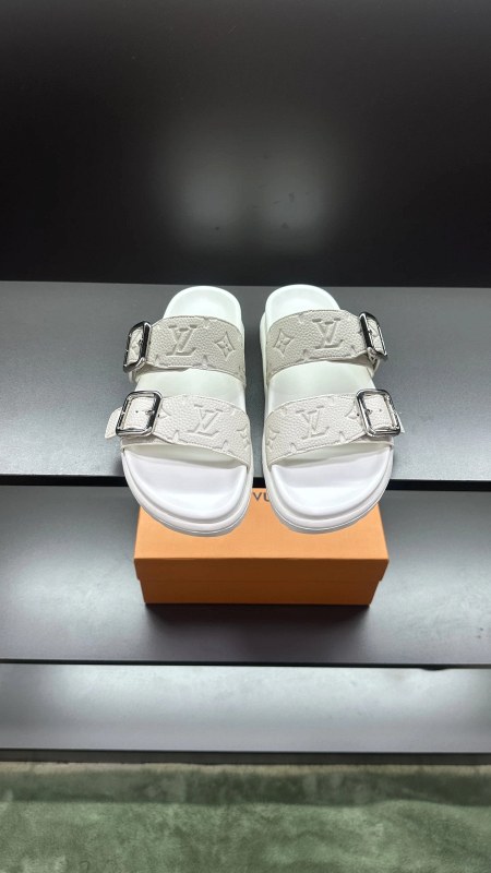 White Louis Vuitton Slide with a Stated Italian Leather Upper and a Wide Quoted Size Run