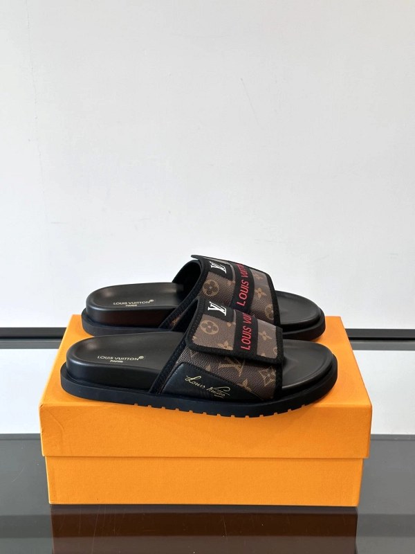 Louis Vuitton black Mini Monogram canvas slides with a Velcro-adjustable wide strap
