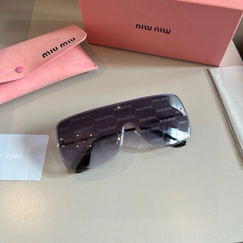 Miu Miu Black Rimless One-Piece-Lens Sunglasses in a Modern Everyday Shape
