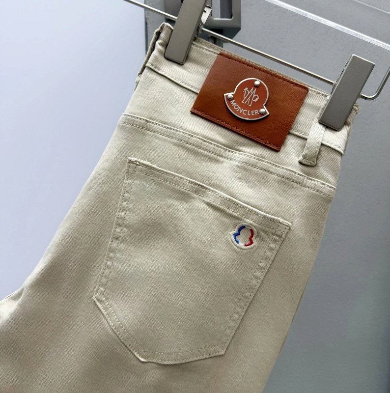 Moncler H102 beige straight-leg pants with a high-rise stretch cut