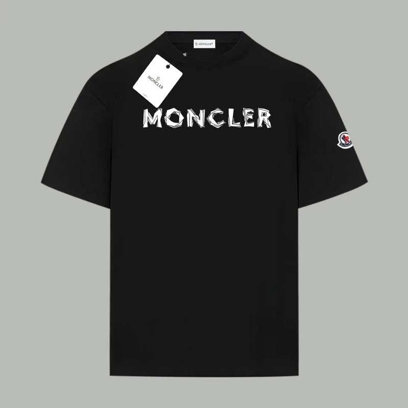 Moncler black cotton tee in a unisex drop-shoulder cut, offered in black or white