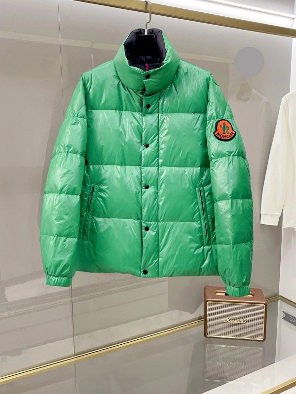 Moncler green puffer jacket in cold-weather street style