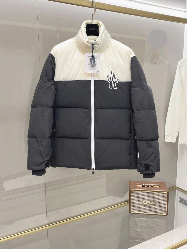 Black Moncler-branded colorblock puffer with a stated 90%-down fill, unisex M–3XL