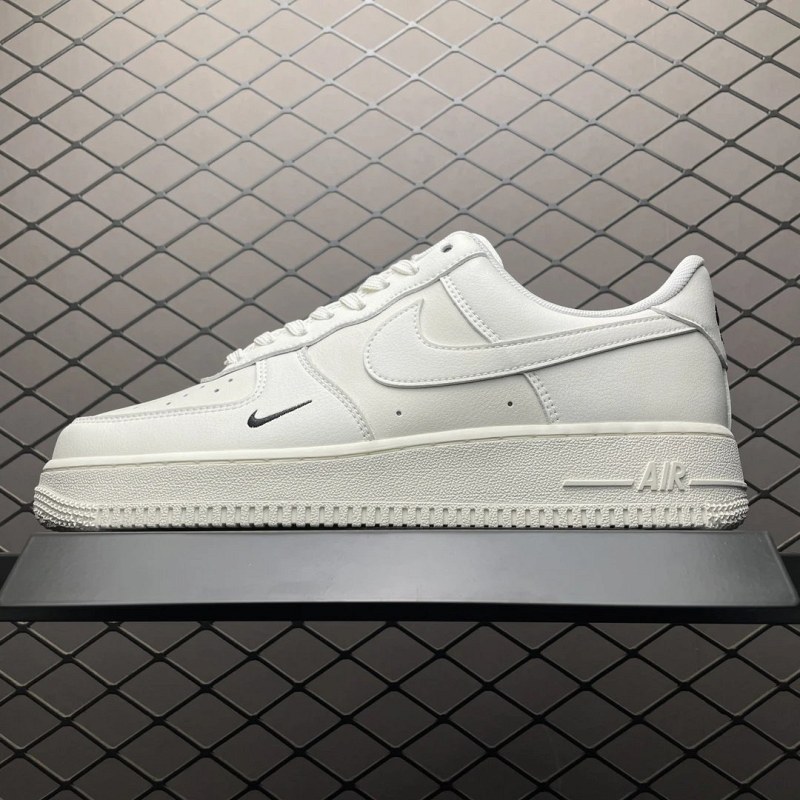 Nike Air Force 1 Low in White and Black With Mini Swoosh