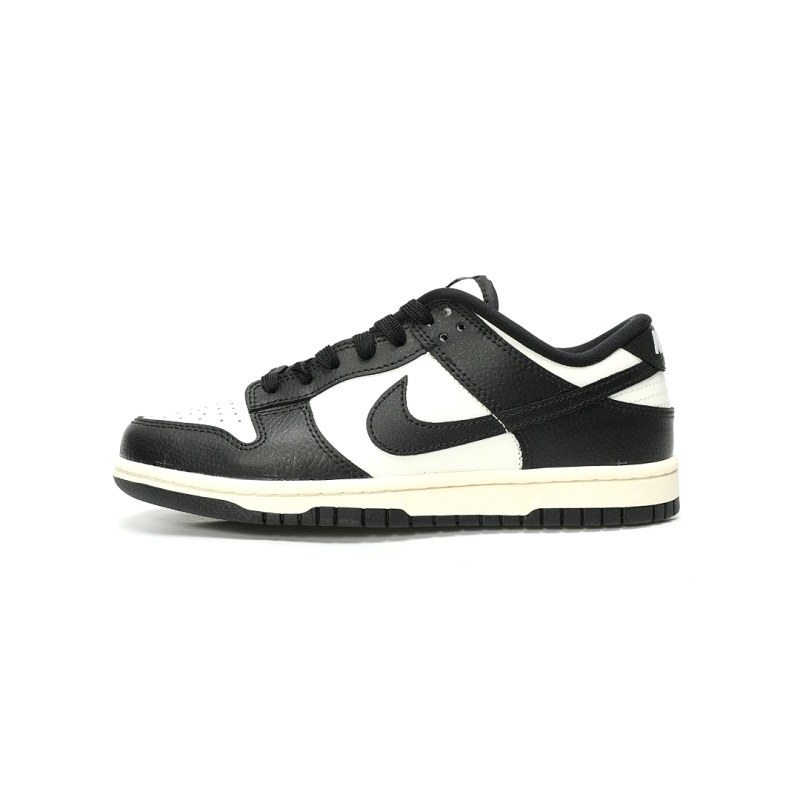 Nike Gray Low-Top Lace-Up Sneaker With a Leather Upper and Half-Size Run