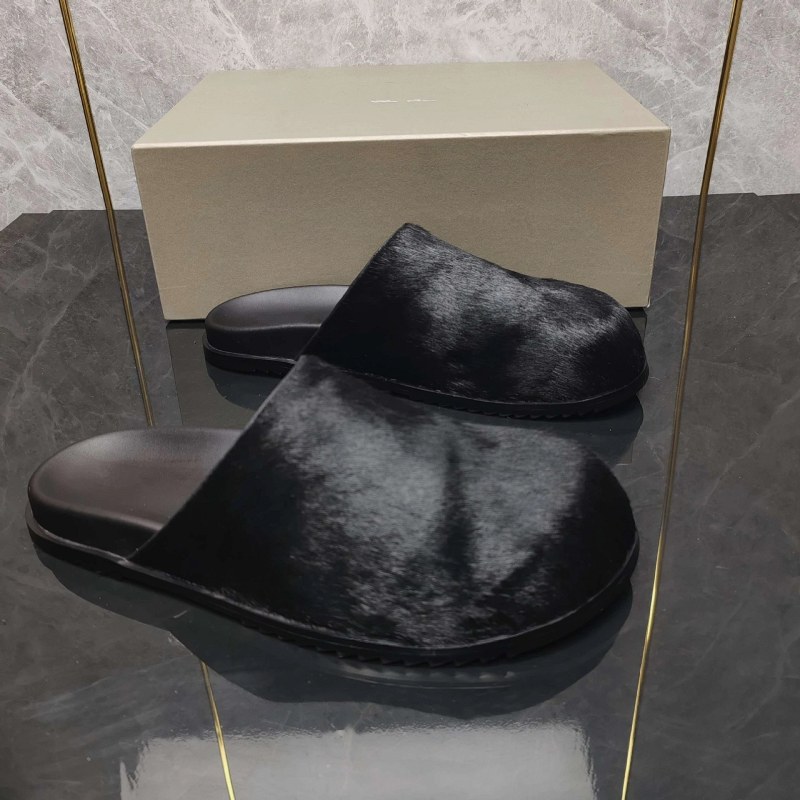 Rick Owens Black Leather High-Top Slip-Ons with a Stitched Rubber Sole